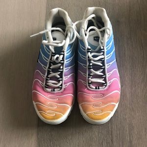 Nike Tn Air tennis shoes.